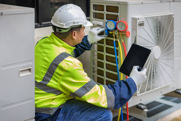 Professional Emergency Hvac Repair technician working in Waynesville, NC